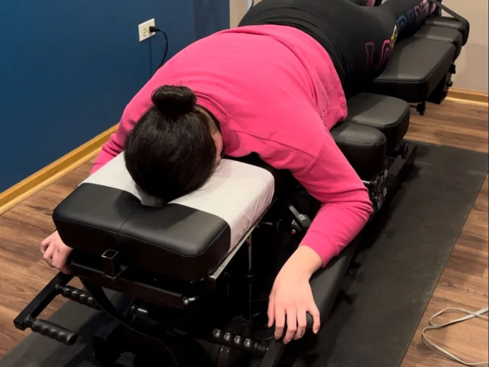 Dr. Juarez giving a chiropractic adjustment in Chicago